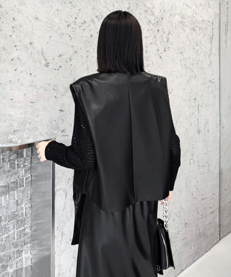 Asymmetrical faux leather vest