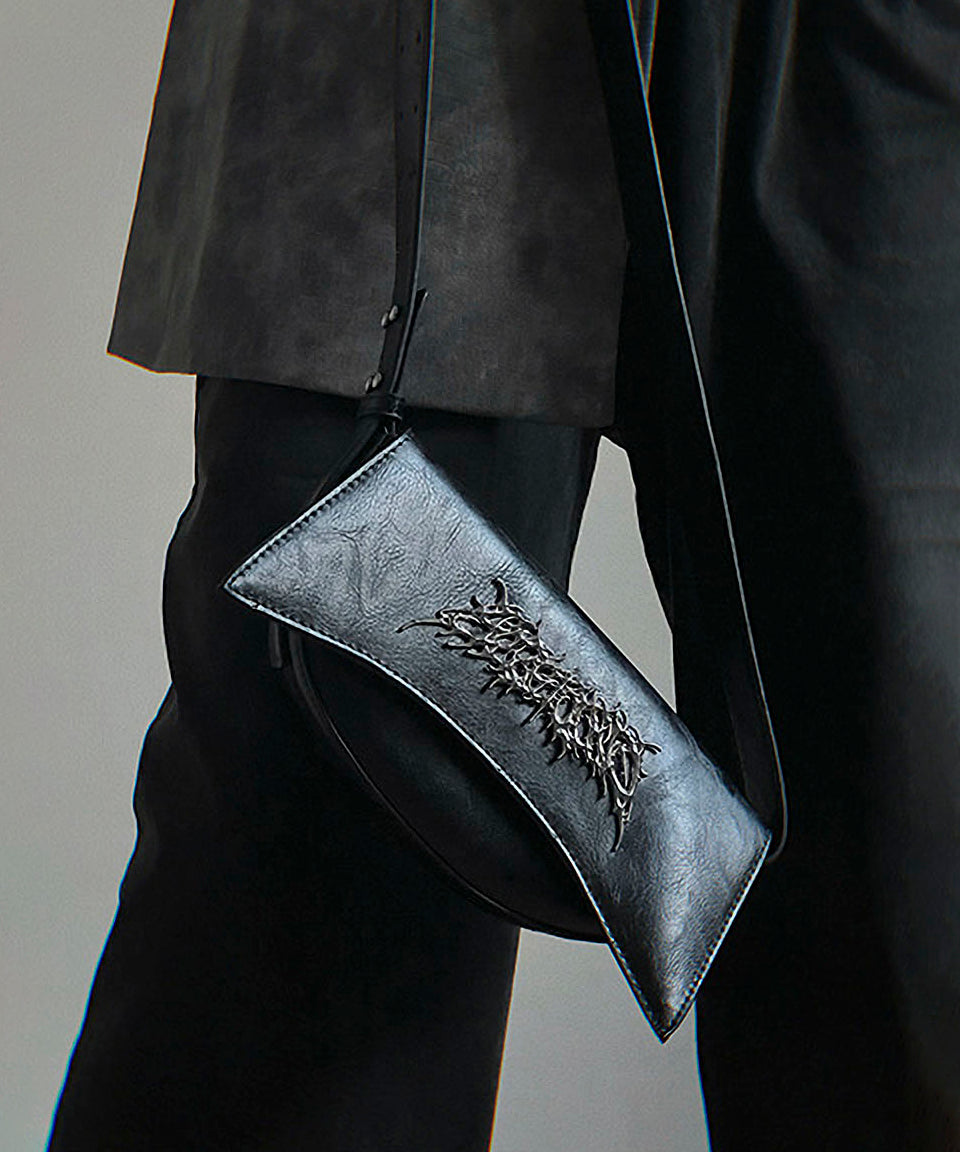 Metal logo shoulder bag