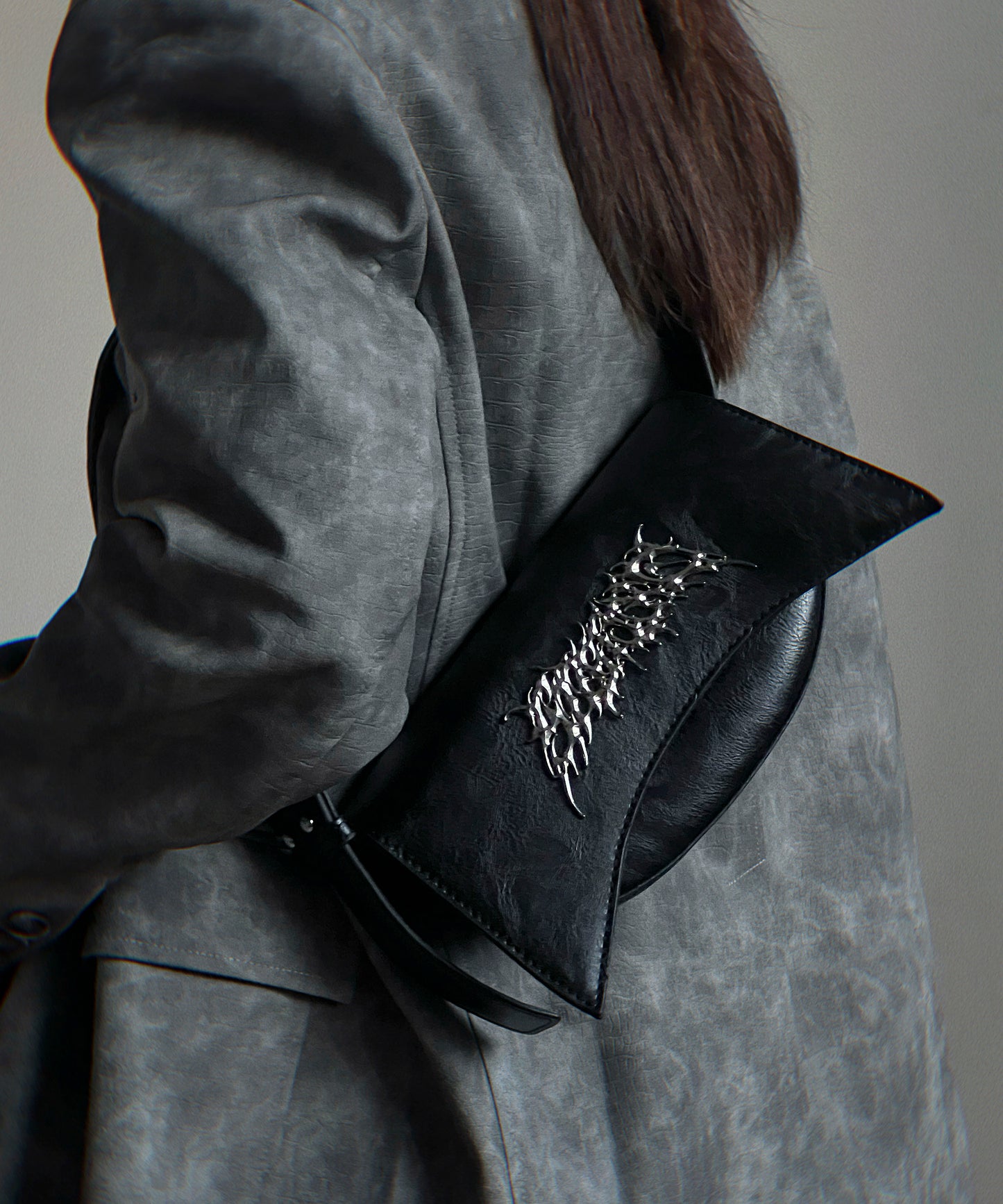 Metal logo shoulder bag