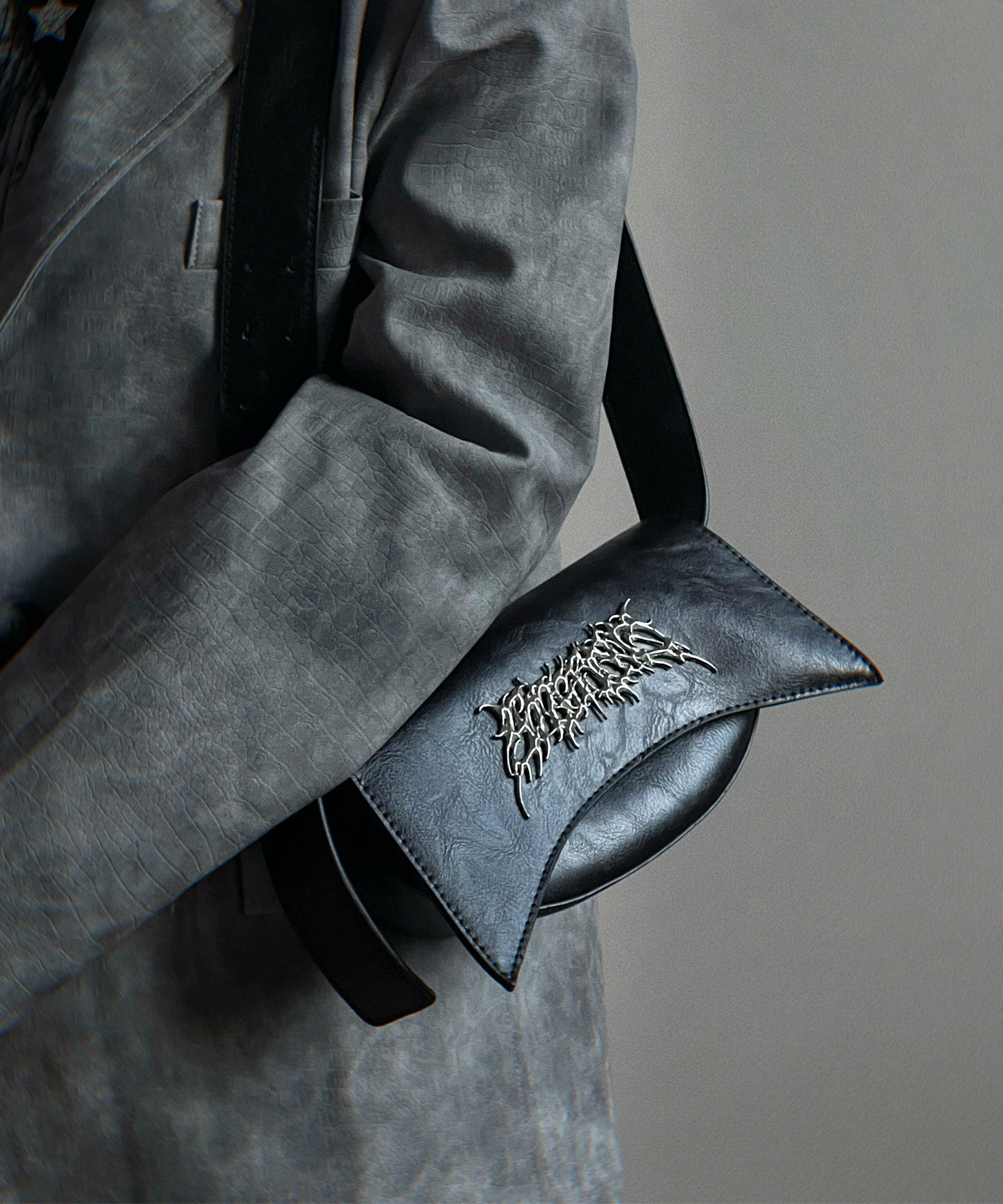 Metal logo shoulder bag