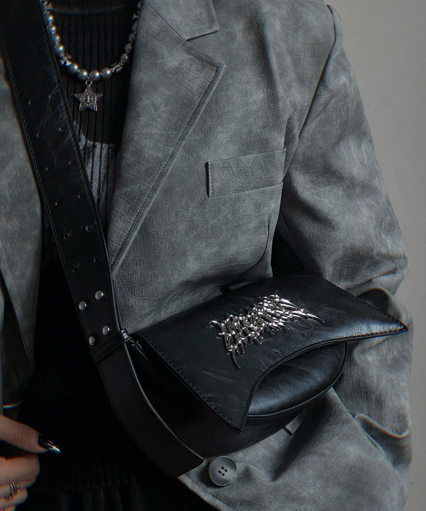 Metal logo shoulder bag