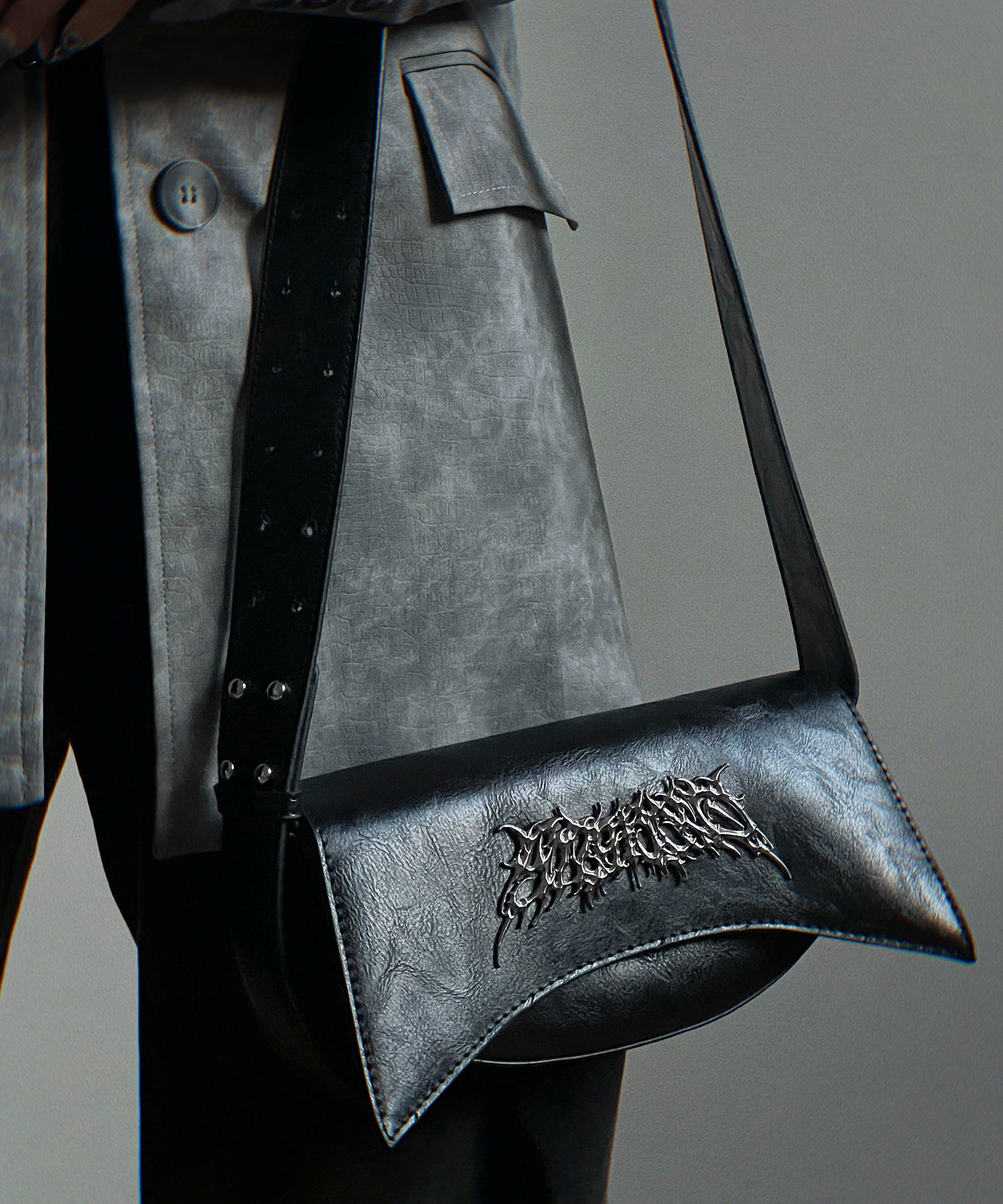 Metal logo shoulder bag