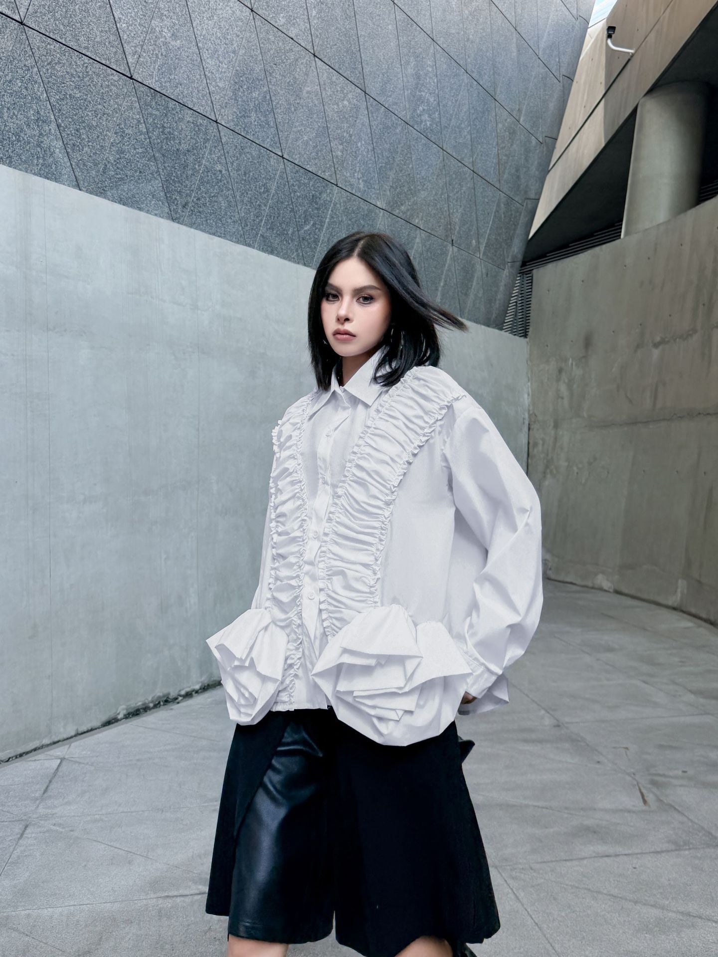 ラッフルペプラムブラウス