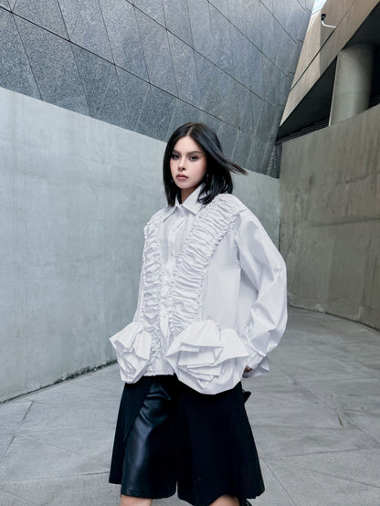 ラッフルペプラムブラウス