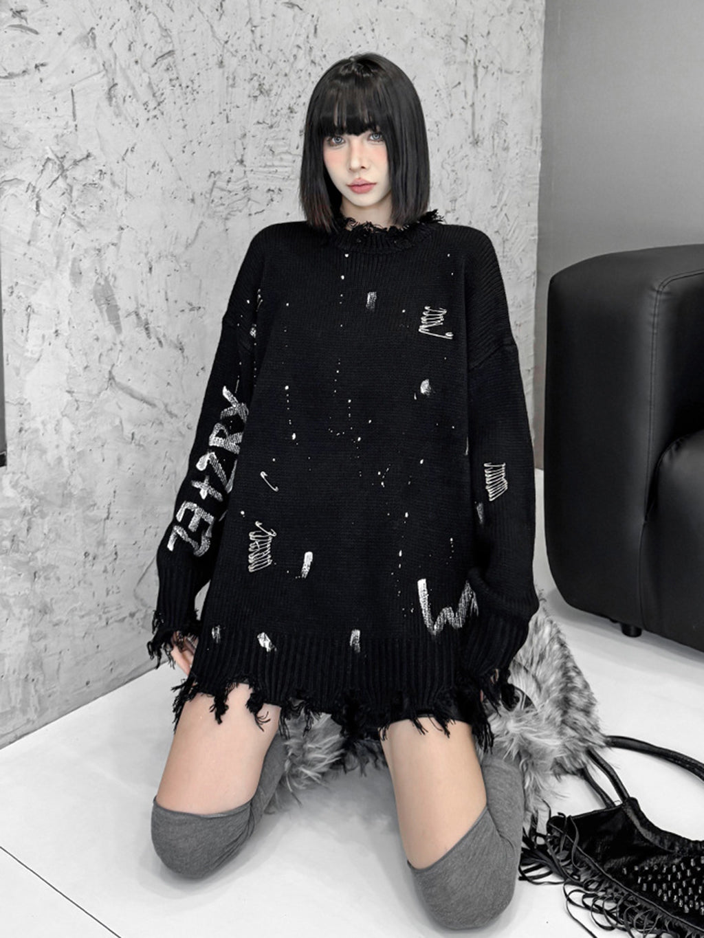 スプラッシュダメージニットトップス