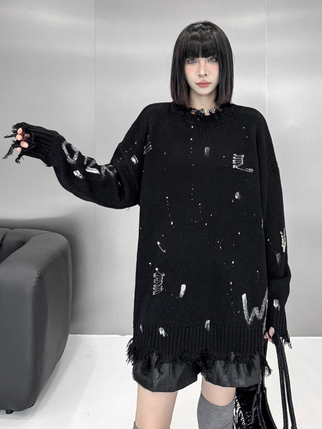 スプラッシュダメージニットトップス