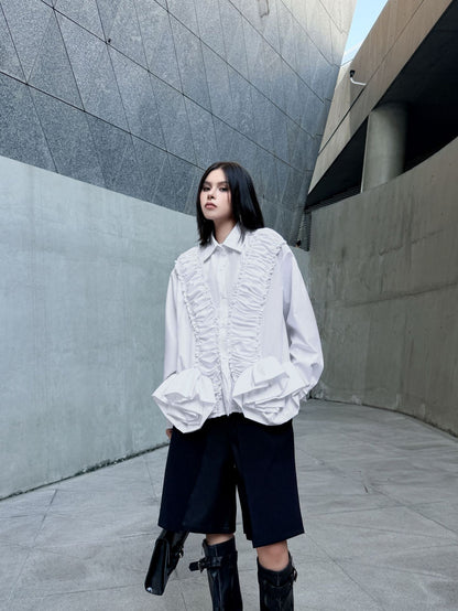 ラッフルペプラムブラウス