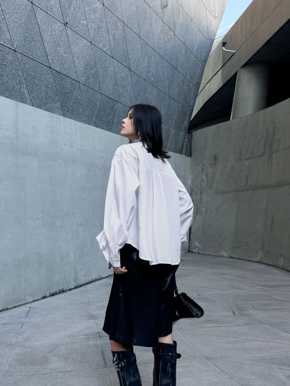 ラッフルペプラムブラウス