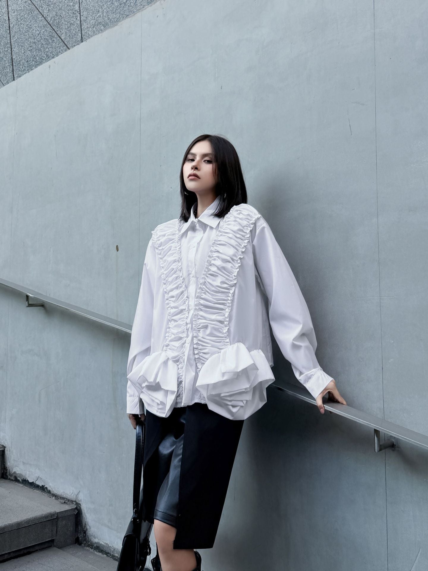 ラッフルペプラムブラウス