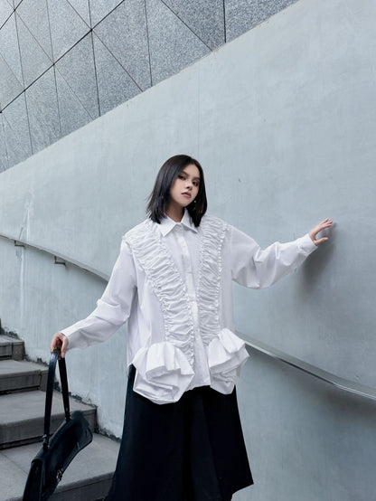 ラッフルペプラムブラウス