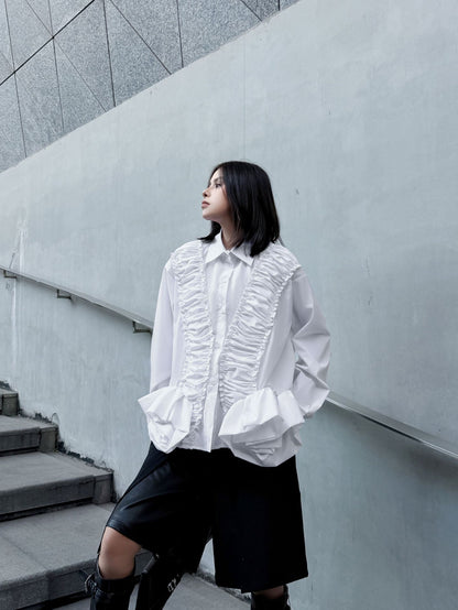 ラッフルペプラムブラウス