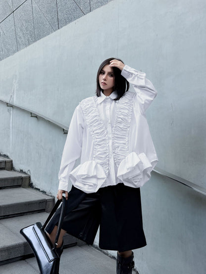 ラッフルペプラムブラウス