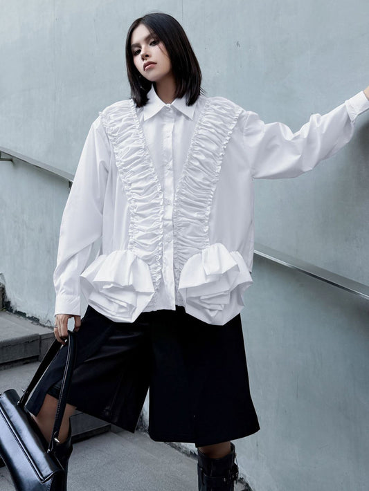 ラッフルペプラムブラウス