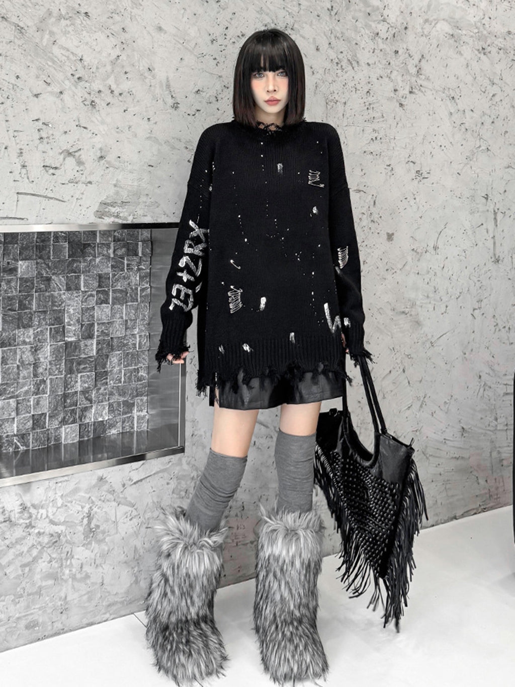 スプラッシュダメージニットトップス