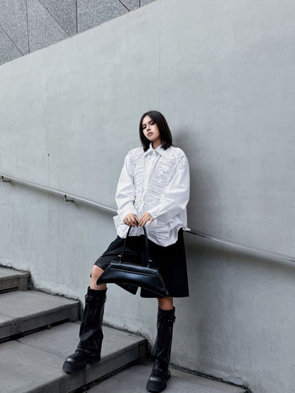 ラッフルペプラムブラウス