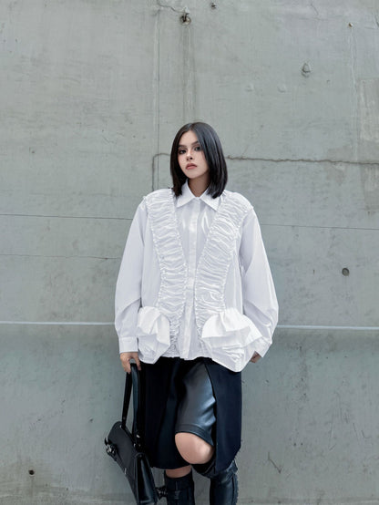 ラッフルペプラムブラウス