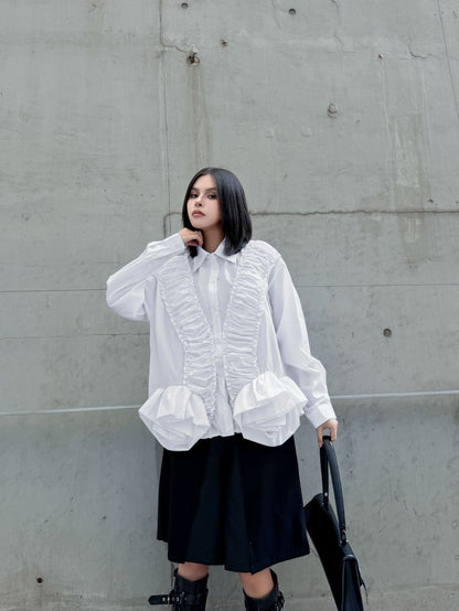 ラッフルペプラムブラウス