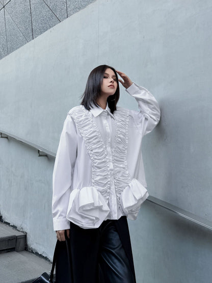 ラッフルペプラムブラウス