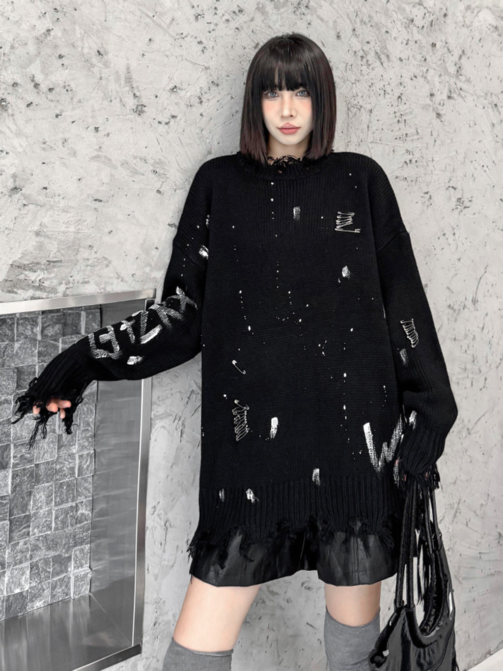 スプラッシュダメージニットトップス