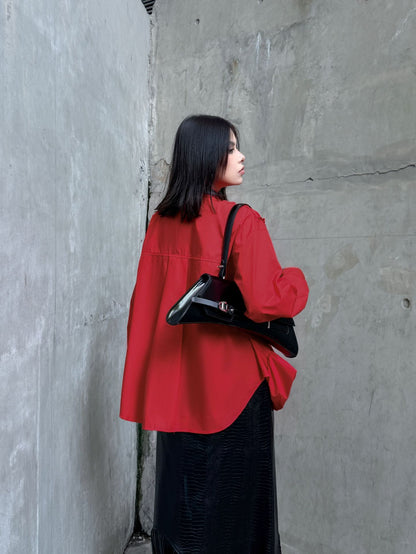 ラッフルペプラムブラウス