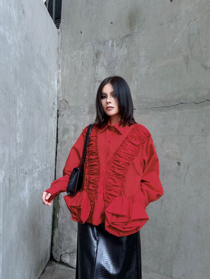 ラッフルペプラムブラウス