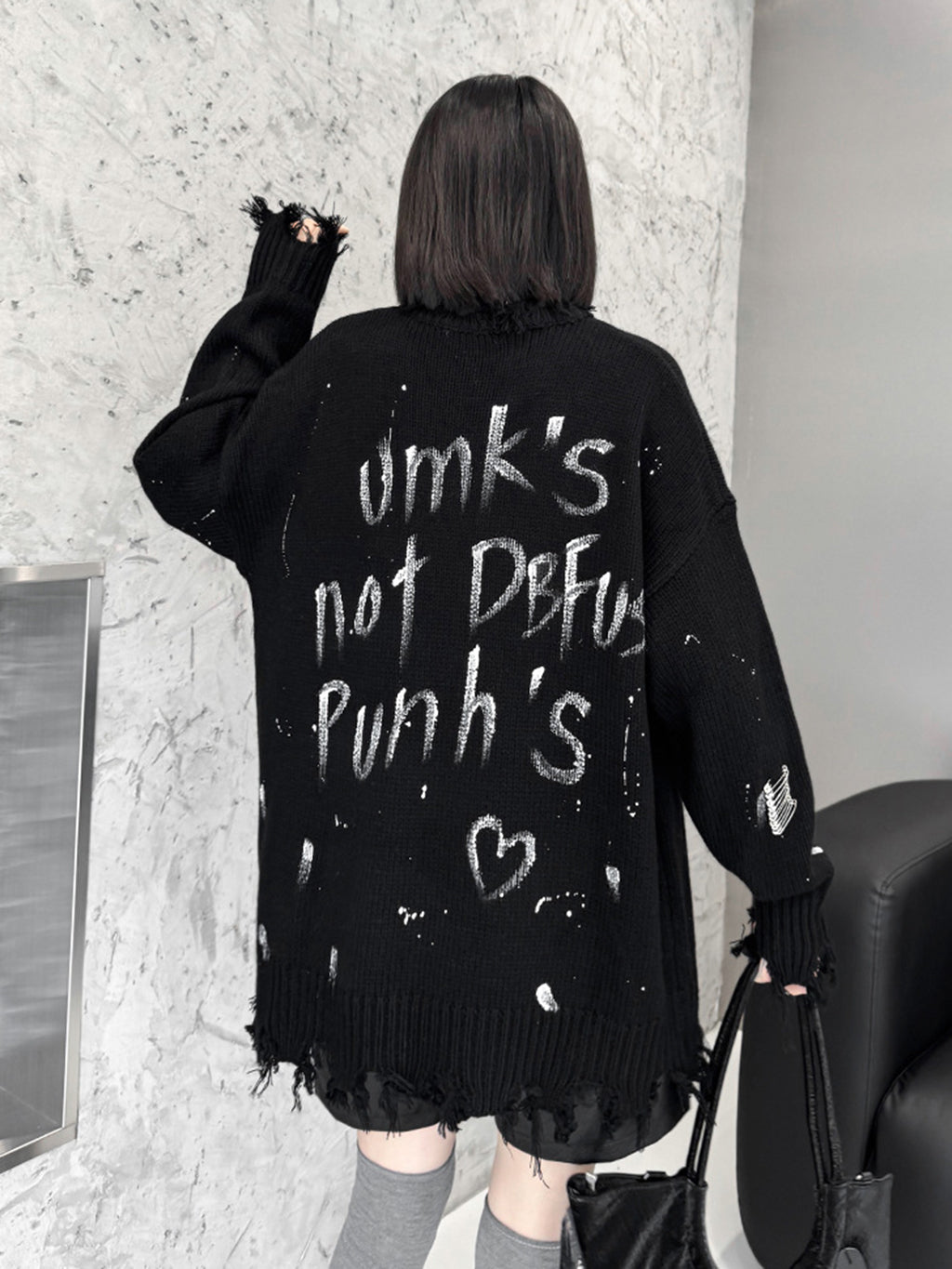 スプラッシュダメージニットトップス