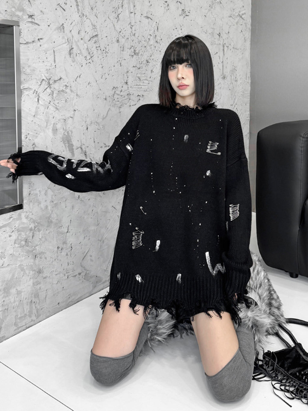 スプラッシュダメージニットトップス