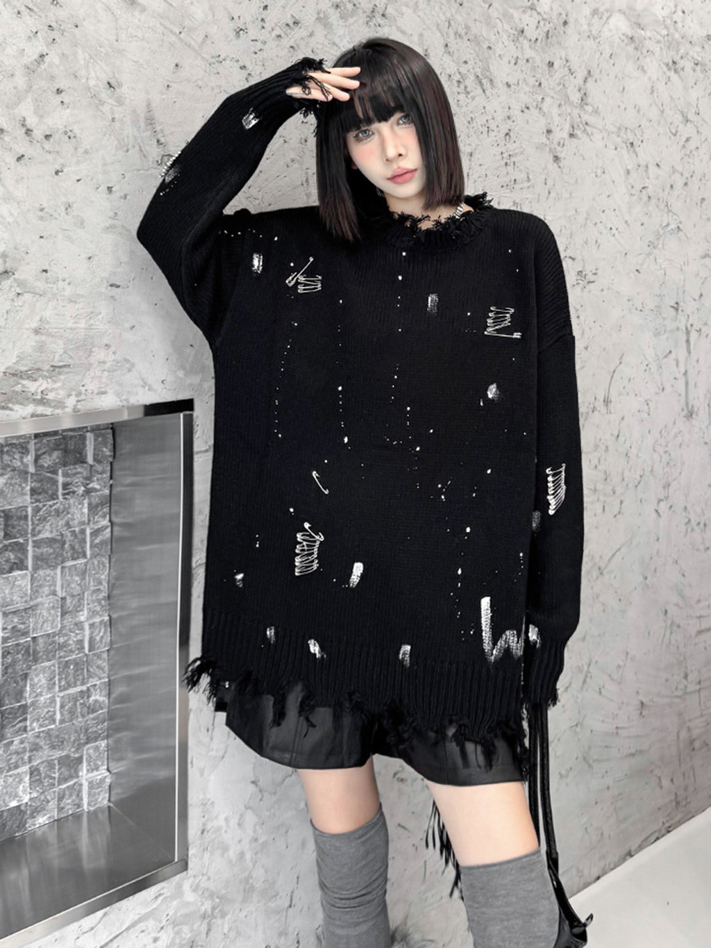 スプラッシュダメージニットトップス