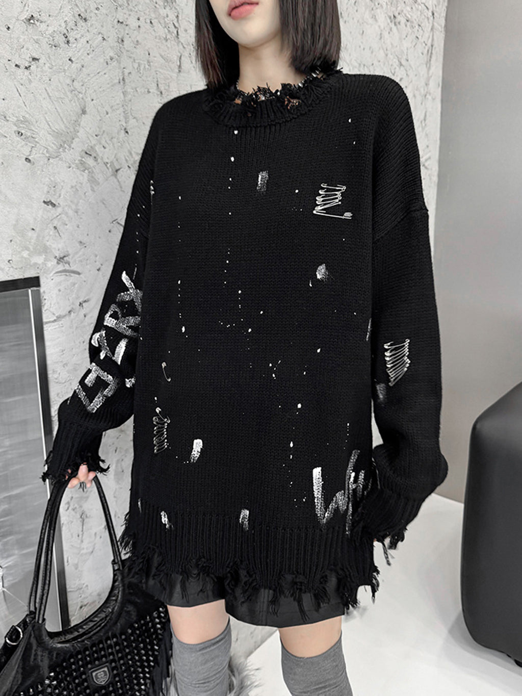 スプラッシュダメージニットトップス