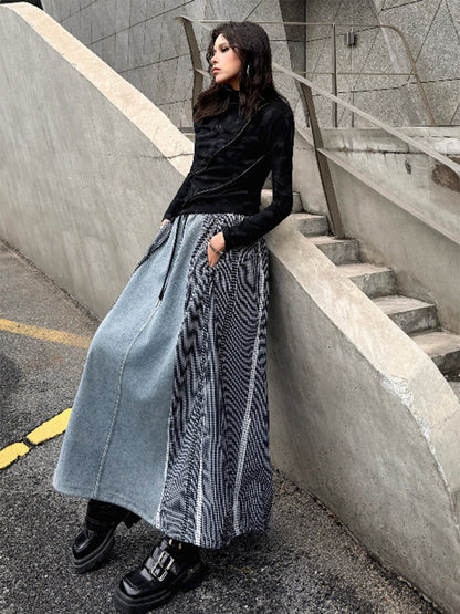 グラヴィティパネルロングスカート