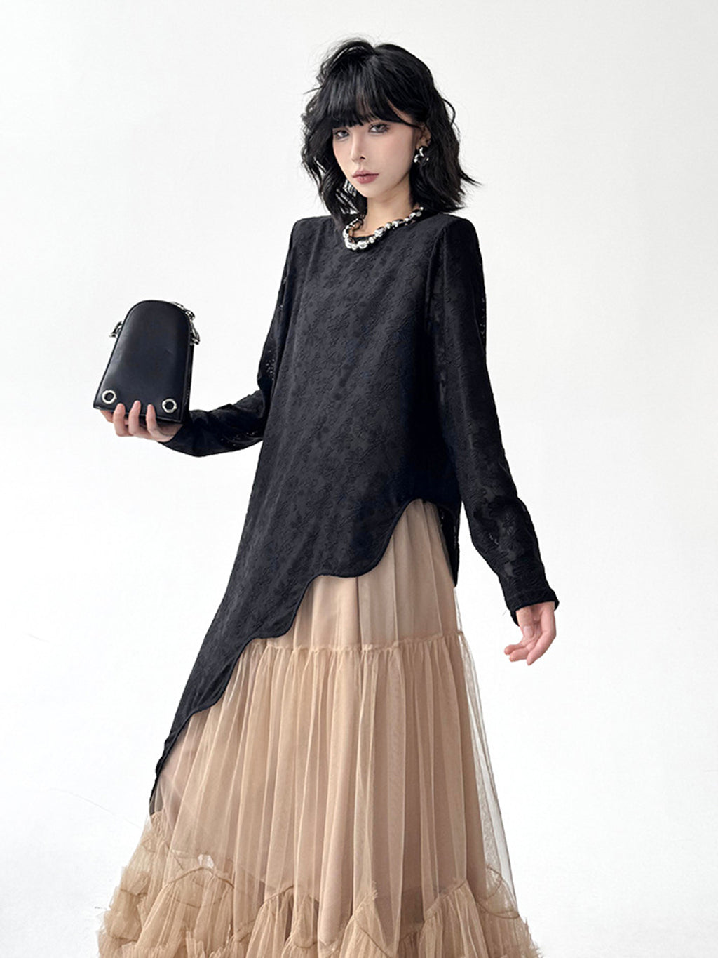 Wave cut see-through top