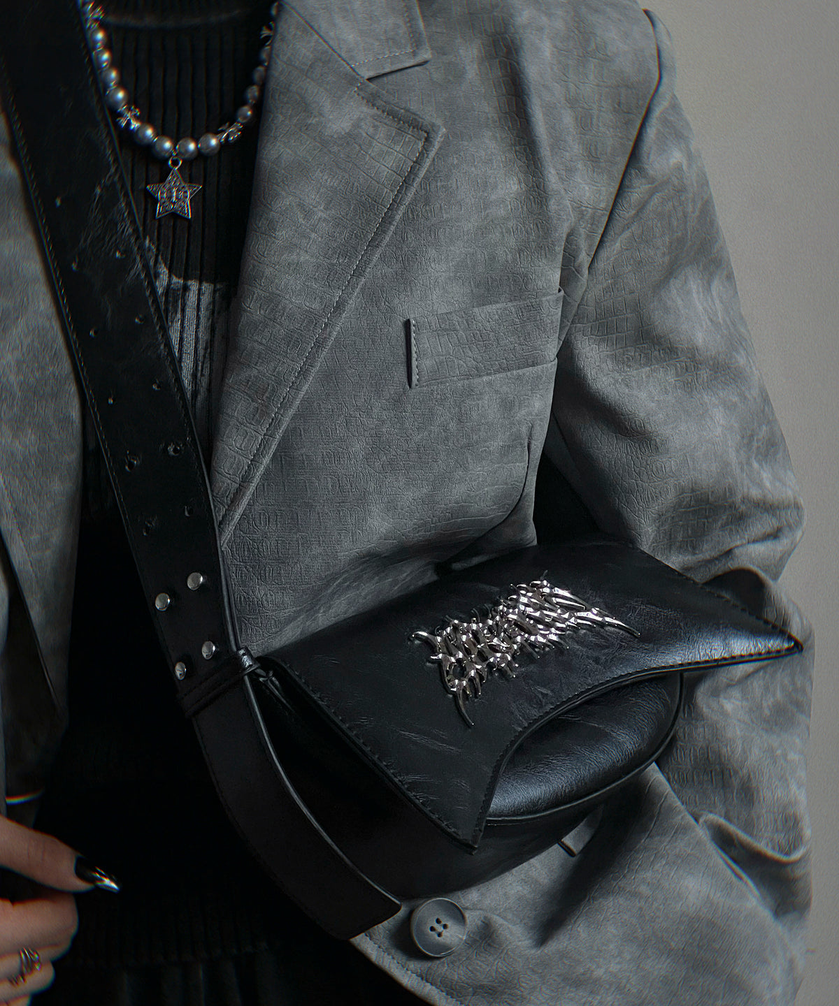 Metal logo shoulder bag